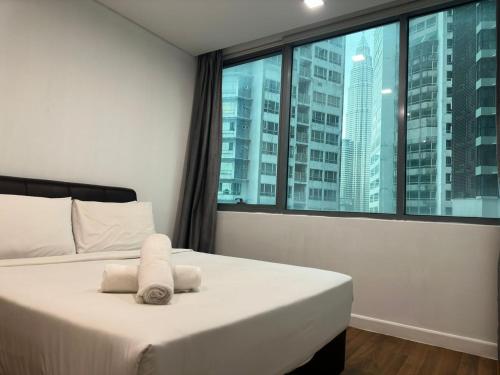 Imagen de la habitación del Hotel Summer Suites KLCC by Luna. Foto 6