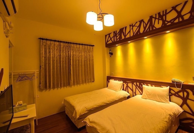Imagen de la habitación del Hotel Summer Travel BandB. Foto 12