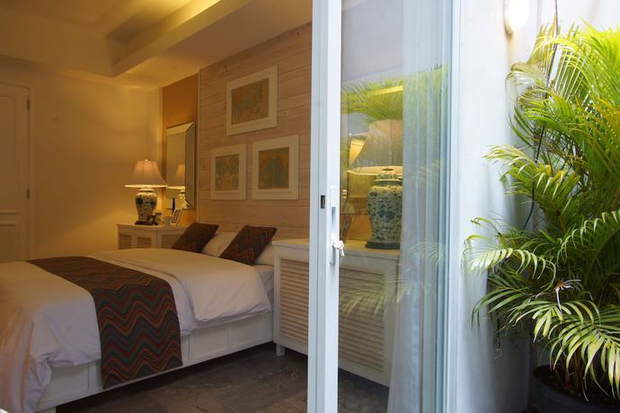 Imagen de la habitación del Hotel Summerhome. Foto 12