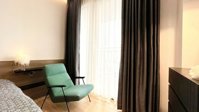 Imagen de la habitación del Hotel Summerset Apartment - RiverGate Residence. Foto 19