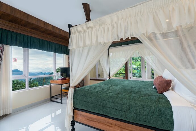 Imagen de la habitación del Hotel Summit Bougainvillea Tea Resort. Foto 9