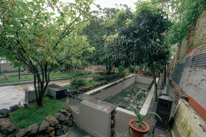 Imagen general del Hotel Summit Bougainvillea Tea Resort. Foto 5