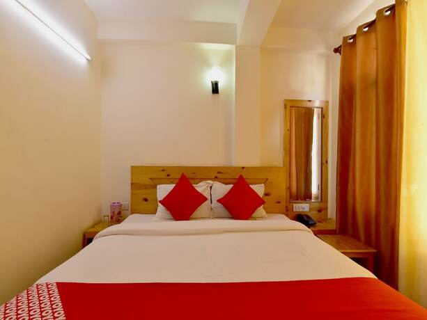 Imagen de la habitación del Hotel Summit Chandertal Regency. Foto 6