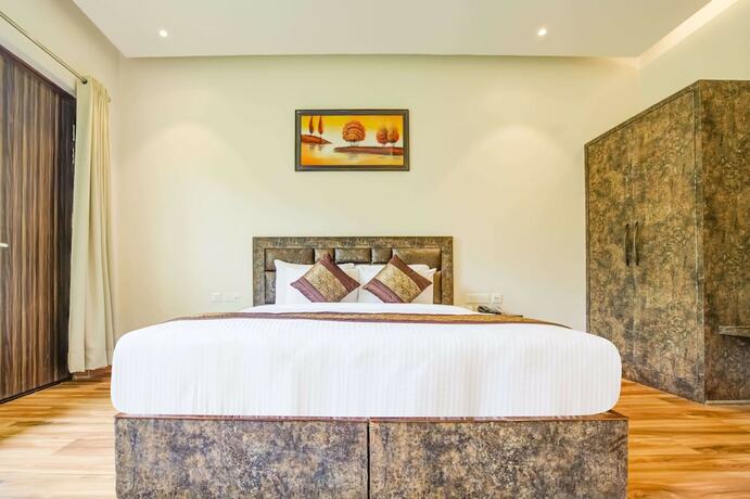 Imagen de la habitación del Hotel Summit Jungle Resort. Foto 10