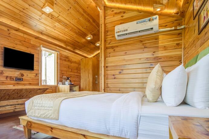 Imagen de la habitación del Hotel Summit Jungle Resort. Foto 12