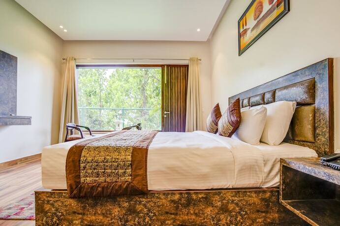 Imagen de la habitación del Hotel Summit Jungle Resort. Foto 13