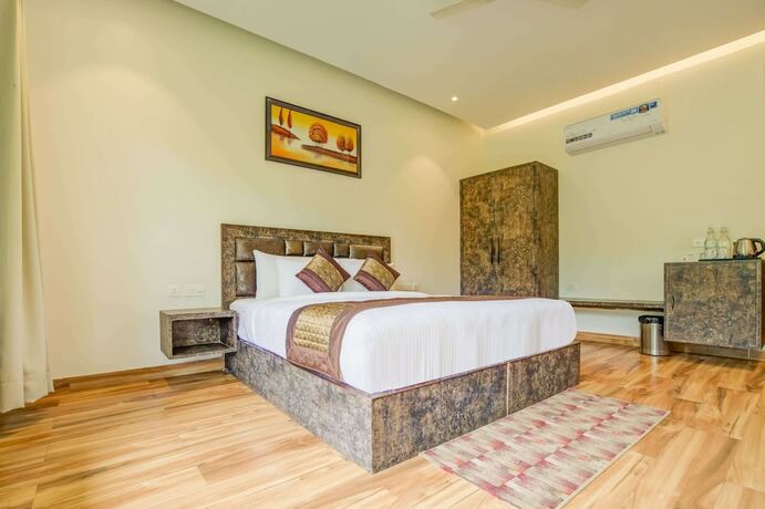 Imagen de la habitación del Hotel Summit Jungle Resort. Foto 14