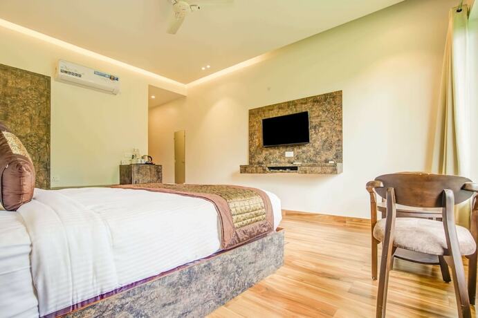 Imagen de la habitación del Hotel Summit Jungle Resort. Foto 15