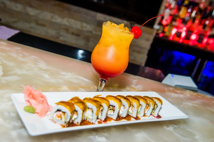 Imagen del bar/restaurante del Hotel Summit Rainforest and Golf Resort. Foto 3