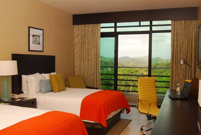 Imagen de la habitación del Hotel Summit Rainforest and Golf Resort. Foto 9