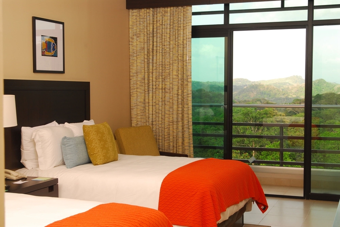 Imagen de la habitación del Hotel Summit Rainforest and Golf Resort. Foto 10