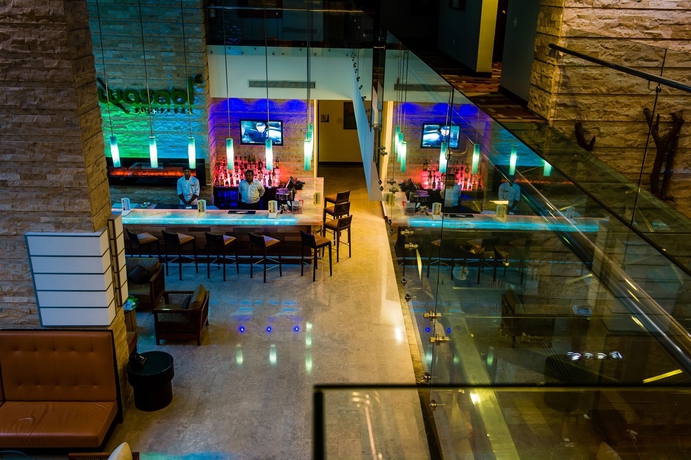 Imagen del bar/restaurante del Hotel Summit Rainforest and Golf Resort. Foto 4