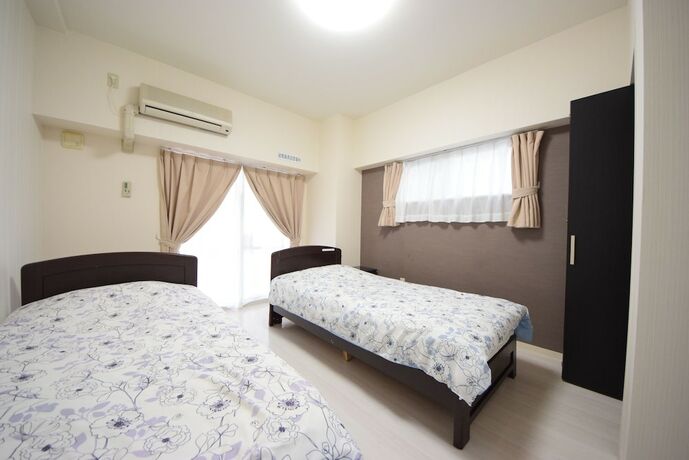Imagen de la habitación del Hotel Sumuka Asato Station. Foto 12