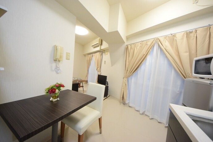 Imagen de la habitación del Hotel Sumuka Asato Station. Foto 20