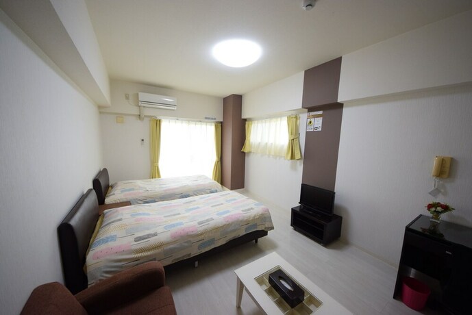Imagen de la habitación del Hotel Sumuka Asato Station. Foto 23
