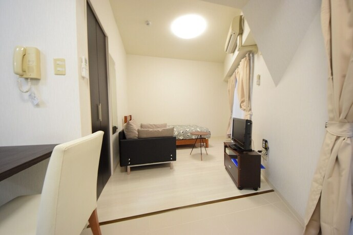 Imagen de la habitación del Hotel Sumuka Asato Station. Foto 25