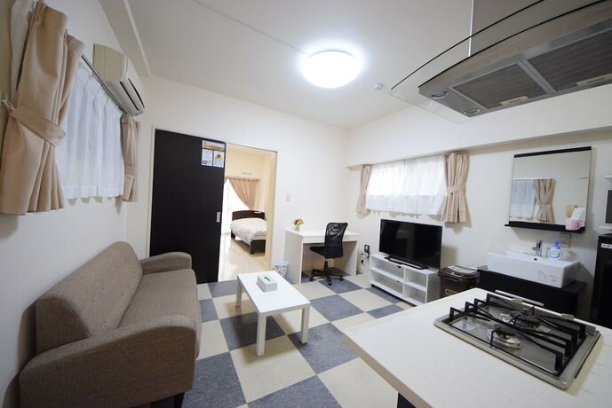 Imagen de la habitación del Hotel Sumuka Asato Station. Foto 26