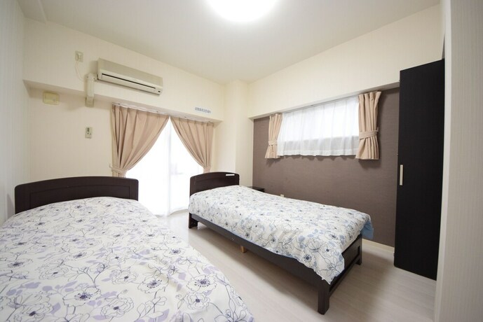 Imagen de la habitación del Hotel Sumuka Asato Station. Foto 28