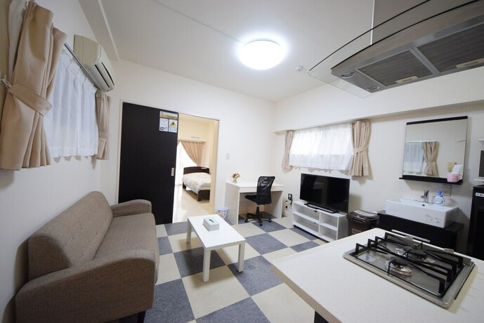 Imagen de la habitación del Hotel Sumuka Asato Station. Foto 33