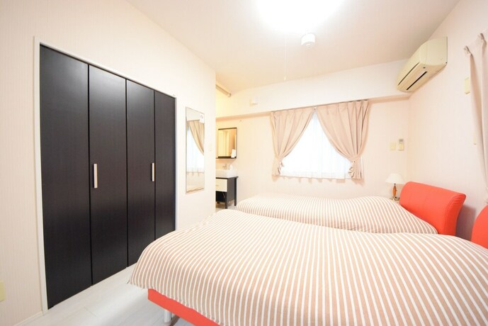 Imagen de la habitación del Hotel Sumuka Shintoshin Ii. Foto 16
