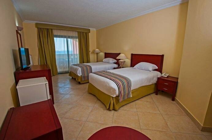 Imagen de la habitación del Hotel Sun And Sea And Aqua Park - Hurghada. Foto 17