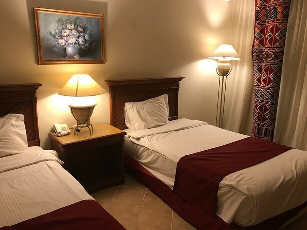 Imagen de la habitación del Hotel Sun And Sea And Aqua Park - Hurghada. Foto 18