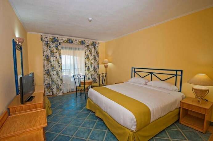 Imagen de la habitación del Hotel Sun And Sea And Aqua Park - Hurghada. Foto 19