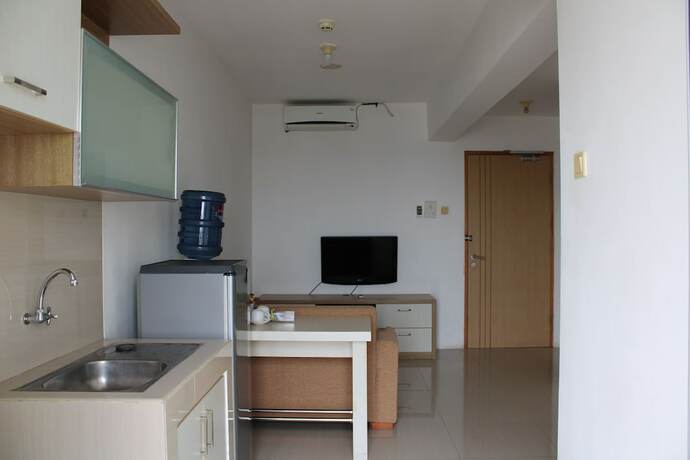 Imagen de la habitación del Hotel Sun Apartment Semarang. Foto 10