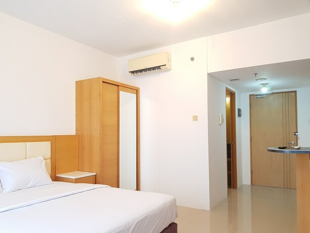 Imagen de la habitación del Hotel Sun Apartment Semarang. Foto 12
