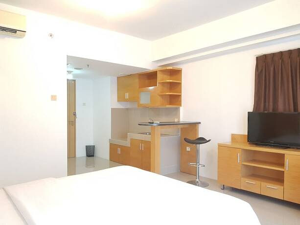 Imagen de la habitación del Hotel Sun Apartment Semarang. Foto 13