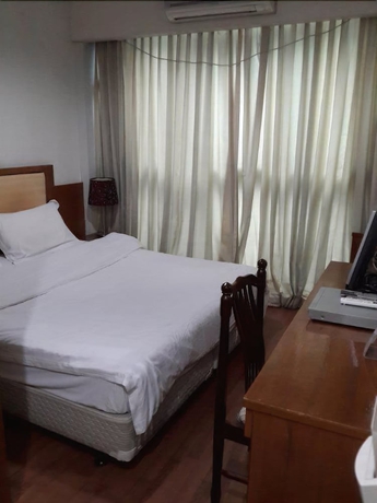 Imagen de la habitación del Hotel Sun City, Bangkok. Foto 7