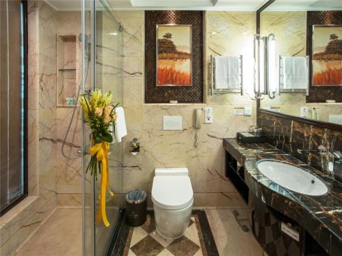 Imagen de la habitación del Hotel Sun City, HAIKOU. Foto 6