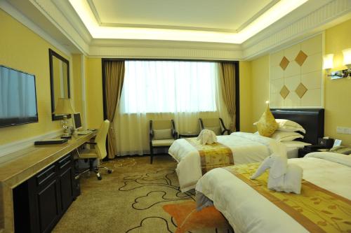 Imagen de la habitación del Hotel Sun City, HAIKOU. Foto 7