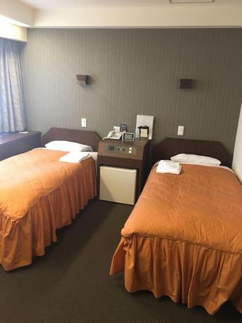 Imagen de la habitación del Hotel Sun City Ikebukuro. Foto 9
