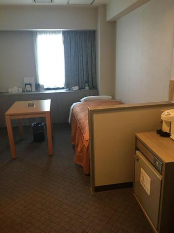 Imagen de la habitación del Hotel Sun City Ikebukuro. Foto 12