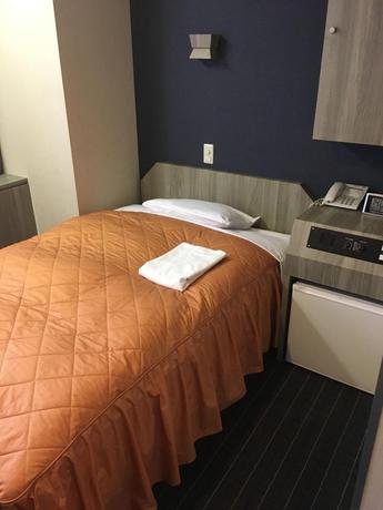 Imagen de la habitación del Hotel Sun City Ikebukuro. Foto 14