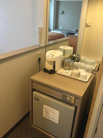 Imagen de la habitación del Hotel Sun City Ikebukuro. Foto 16