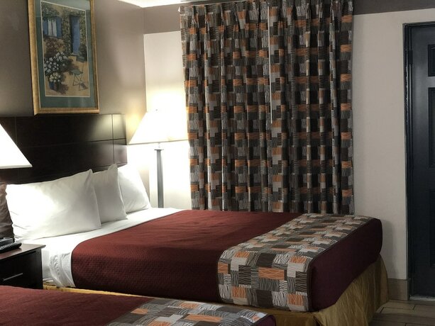 Imagen de la habitación del Hotel Sun Coast Inn. Foto 19