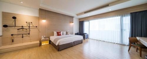 Imagen de la habitación del Hotel Sun Dialogue By Cosmos Creation. Foto 10