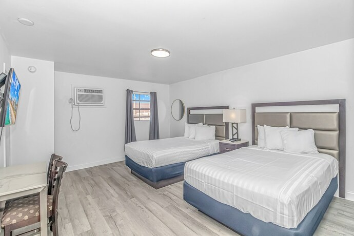 Imagen de la habitación del Hotel Sun Fun Motel. Foto 13