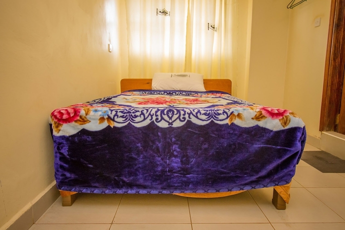 Imagen de la habitación del Hotel Sun Guest House. Foto 2