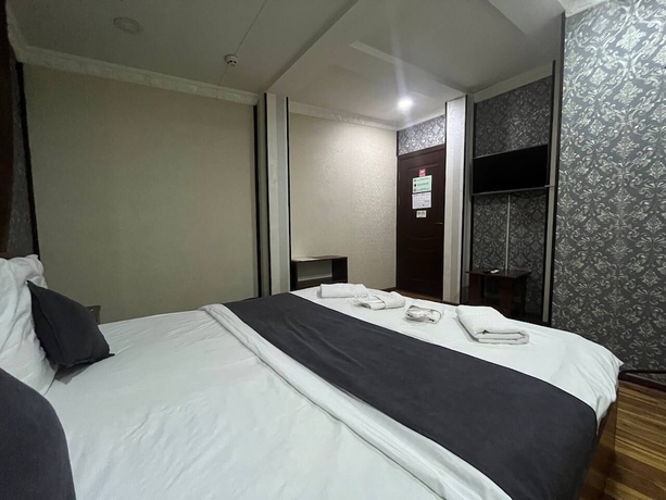 Imagen de la habitación del Hotel Sun Hostel, Taskent. Foto 16