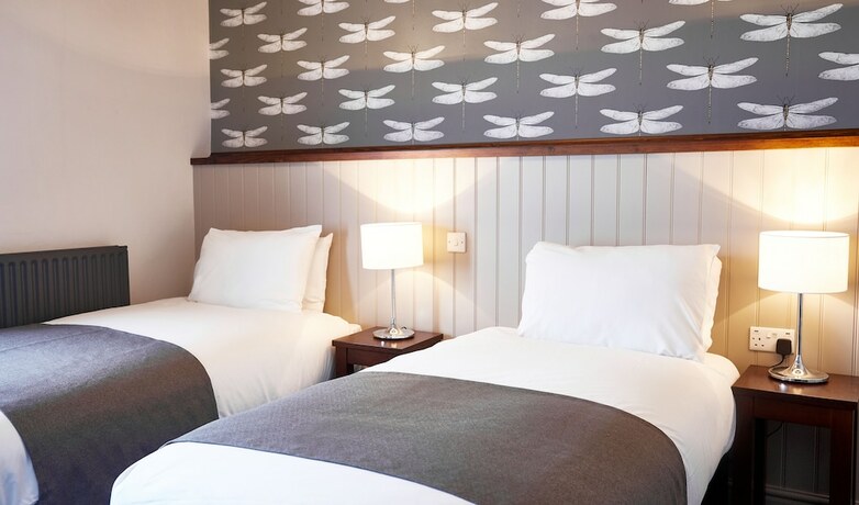 Imagen de la habitación del Hotel Sun Inn. Foto 17