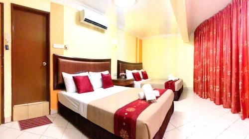Imagen de la habitación del Hotel Sun Inns Batu Caves. Foto 19