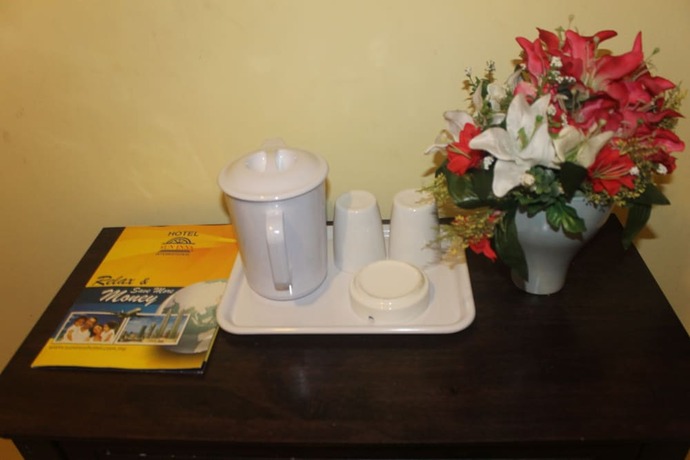 Imagen de la habitación del Hotel Sun Inns Meru Raya. Foto 17