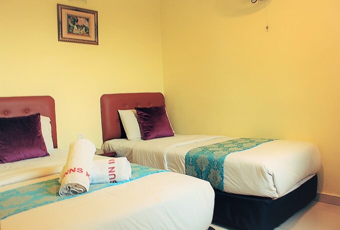 Imagen de la habitación del Hotel Sun Inns Meru Raya. Foto 26