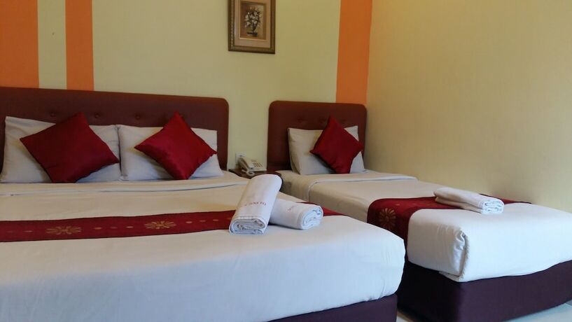 Imagen de la habitación del Hotel Sun Inns Meru Raya. Foto 28