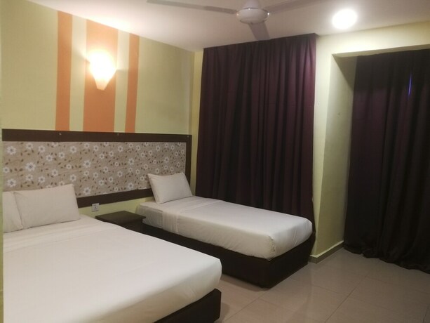 Imagen de la habitación del Hotel Sun Inns Permas Jaya. Foto 13