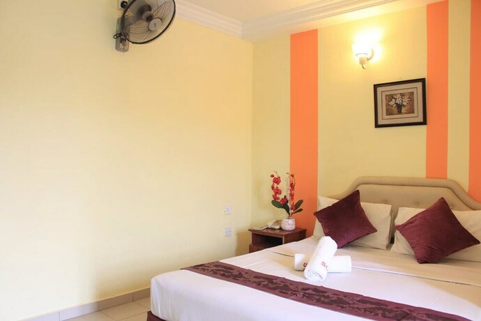 Imagen de la habitación del Hotel Sun Inns Permas Jaya. Foto 18