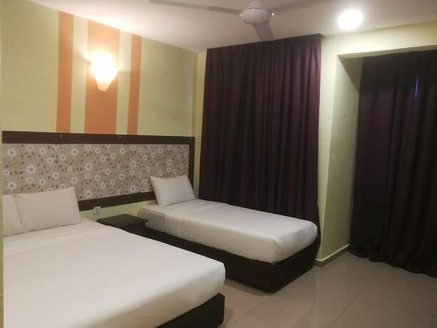 Imagen de la habitación del Hotel Sun Inns Permas Jaya. Foto 19